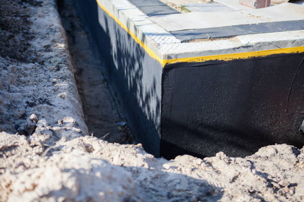 Professional Basement Waterproofing technician working in Tracy City, TN